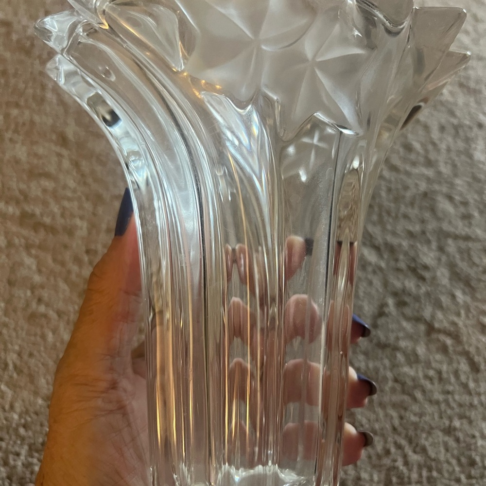 Beautiful 6 1/2” glass vase with etched leaves.